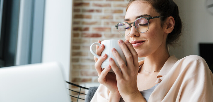 Woman enjoying a cup of coffee